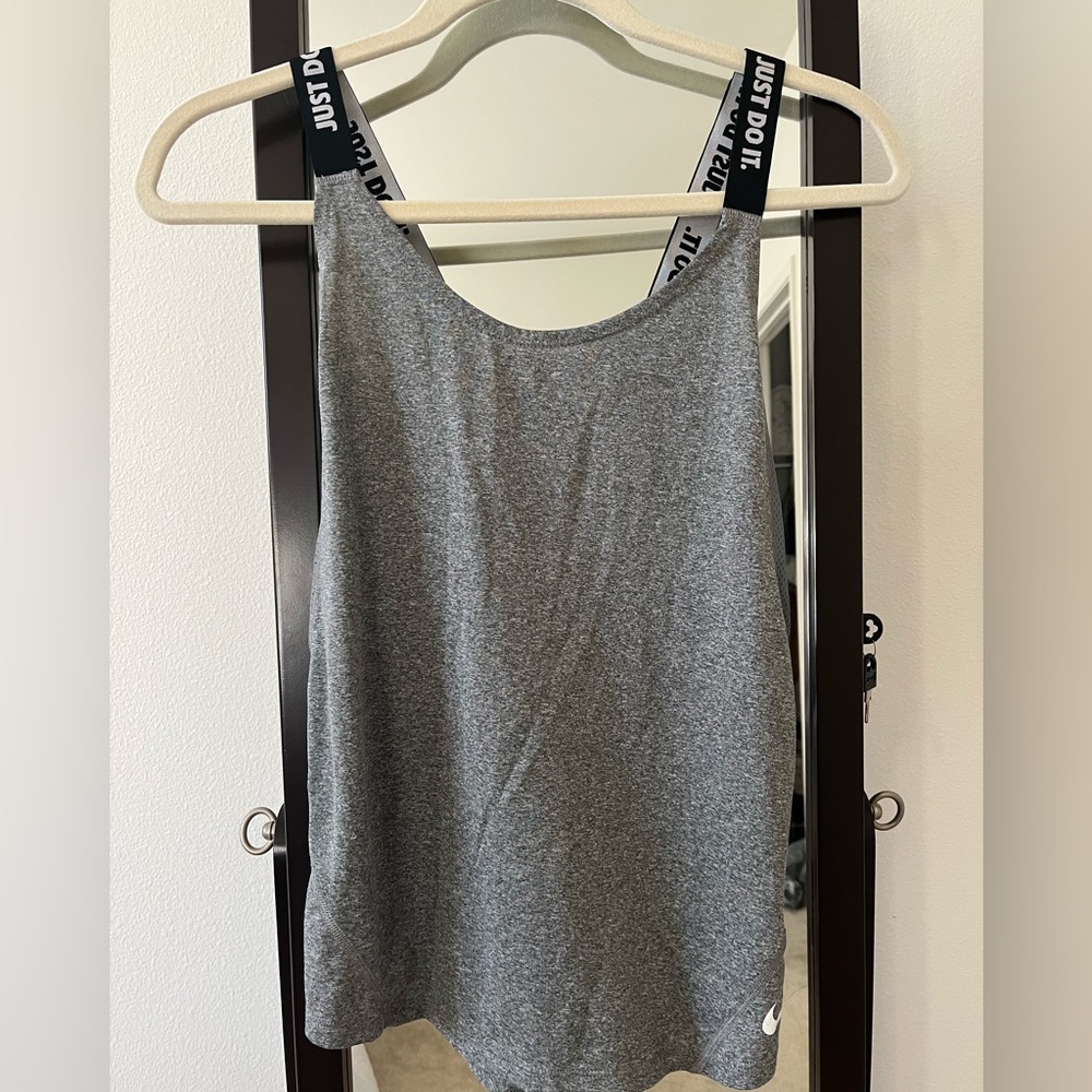 Medium DriFit Nike tank top, never worn.